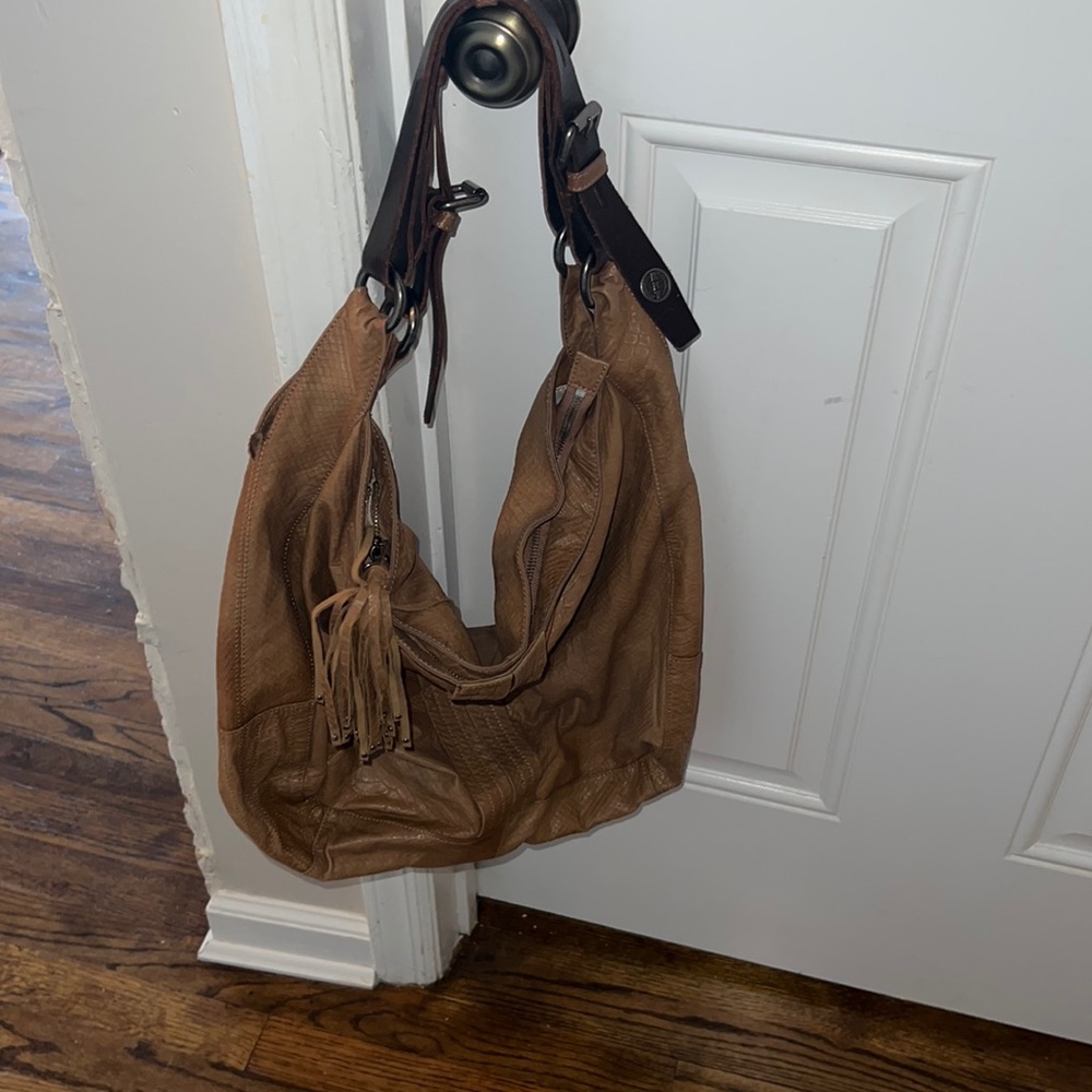 Beautiful leather tote bag with zipper closure & leather tassel
